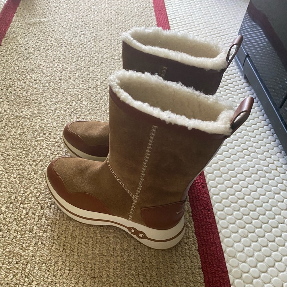Never worn Tory Burch shearling suede boots.  9.5